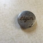 1950s 16 h.p. Elgin tiller handle "ELGIN" push on trim piece